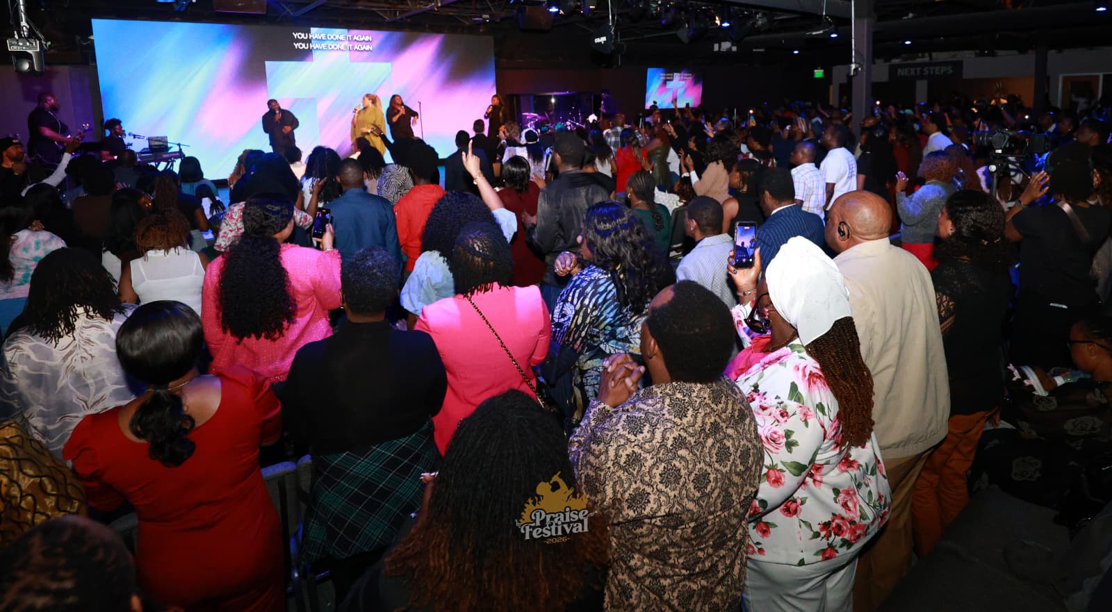 Worship artist performing at a Praise Festival event